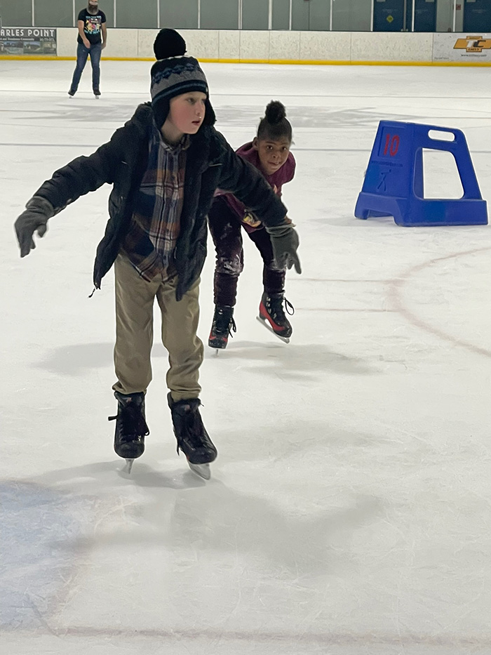 student ice skating